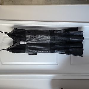 Faux leather and Mesh BeBe dress